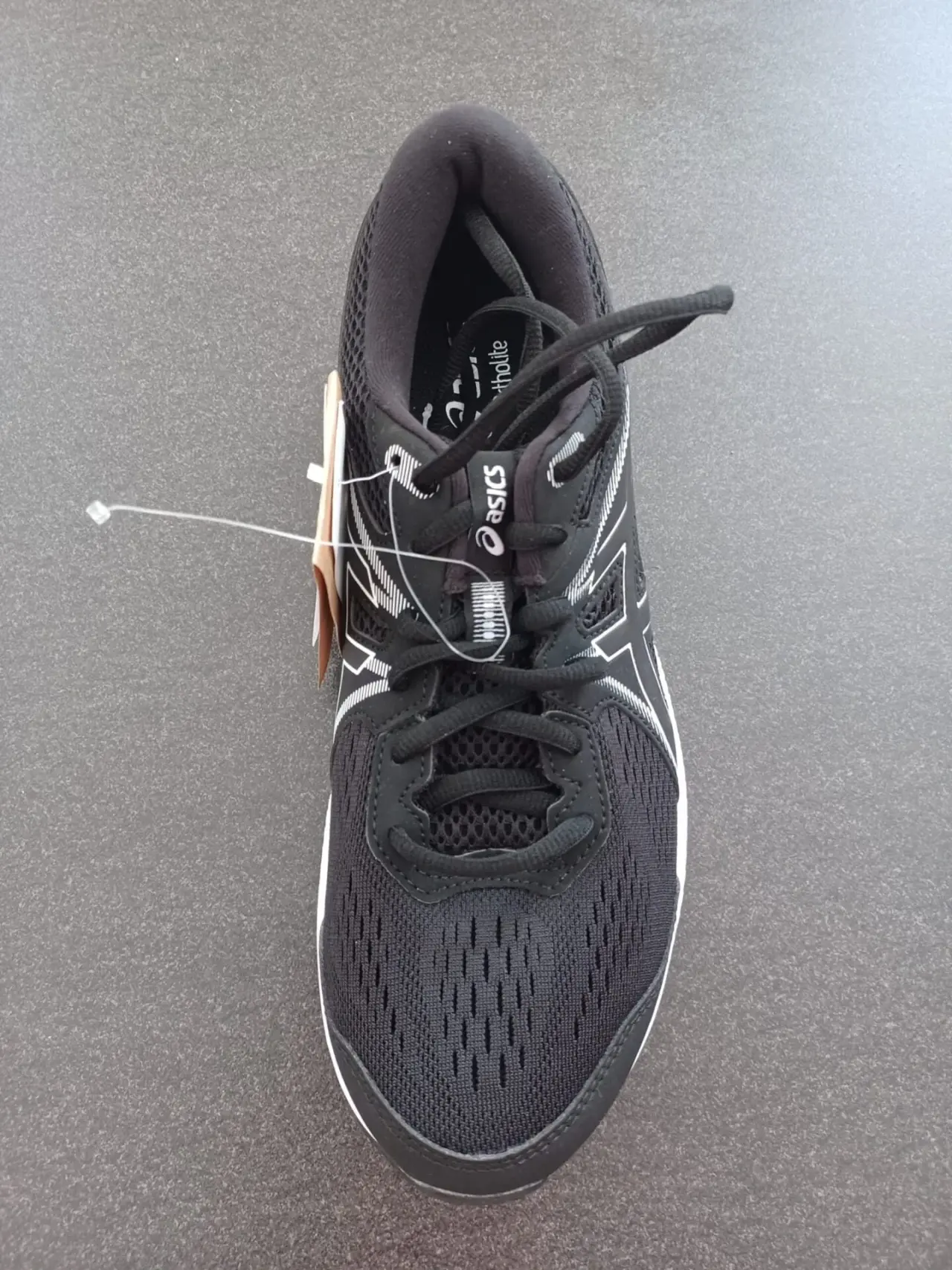 Chaussure de running Asics noire, neuve, en tissu maillé et synthétique, avec semelle Ortholite et son étiquette